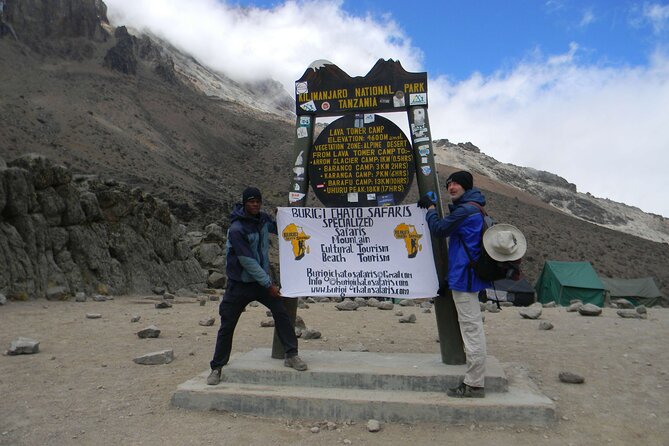6 Days Kilimanjaro hiking tour | climb Kilimanjaro Machame Route - Day 6: Mweka Camp to Mweka Door, Back Toward Moshi/Arusha