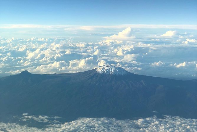 Best Kilimanjaro hiking day trip tour with Kilinge Adventures - Guides matter: Norka, Bubusha, Tyson, Thomas, and the support you’ll feel