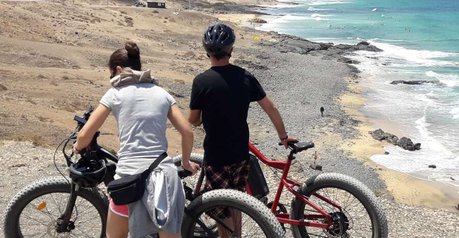 Caleta de Fuste/Corralejo: Guided E-Bike Tour & Crater Hike - Key things that make this tour special