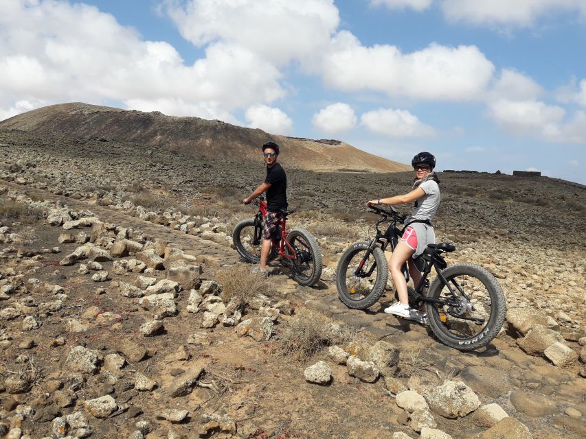 Caleta de Fuste/Corralejo: Guided E-Bike Tour & Crater Hike - El Cotillo lagoon: swimming, photos, and a food reset