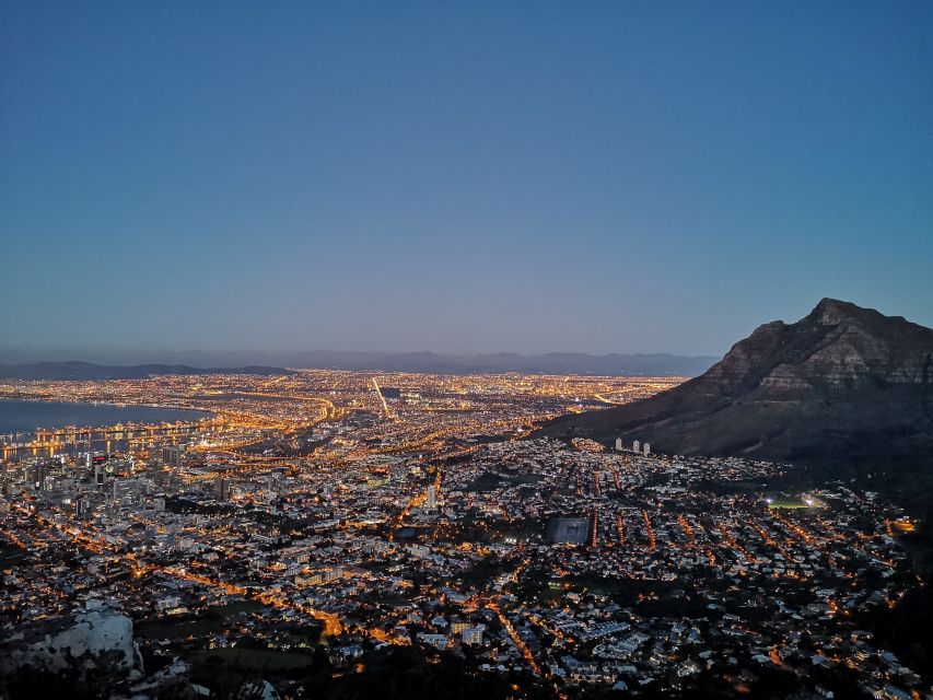 Cape Town: Lion's Head Guided Hike at Sunset - Table Mountain Photo Stop: Evening Light Does the Work