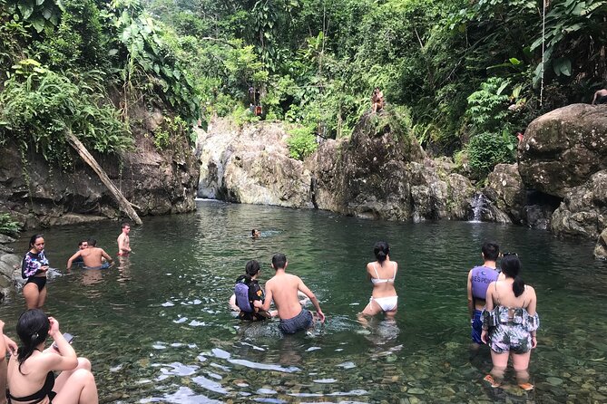 El Yunque Hike Adventure to Las Tinajas Waterfall from Fajardo - Tinajas Waterfall time: swim, rock slides, and the best kind of tired