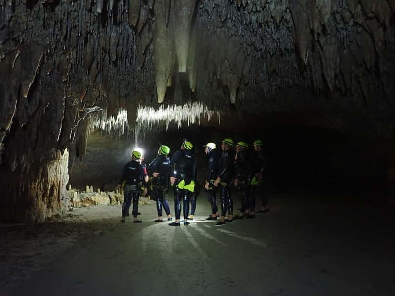Estany d'en Mas: Coastal Hike, Abseil & Sea Cave Exploration - Suits, helmets, lights: getting geared up for sea-cave reality