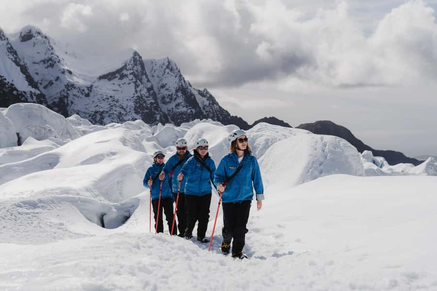 Franz Josef: 2.5 Hour Glacier Hike with Helicopter Transfer - From Glacier Base to the Helipad: Gear Up in Franz Josef Town