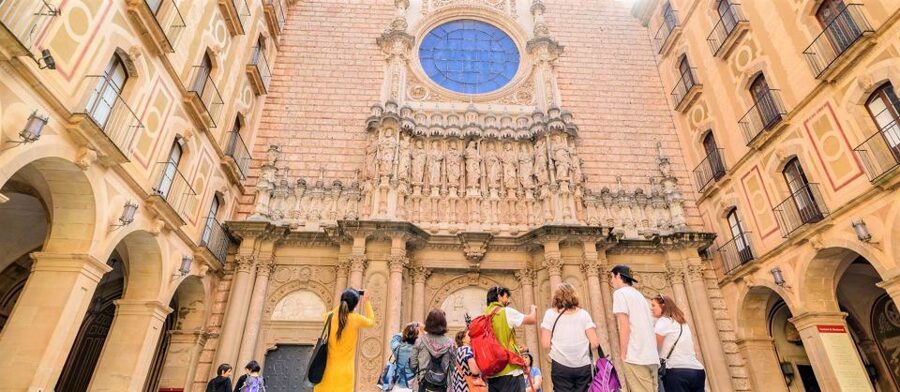 From Barcelona: Montserrat Monastery & Scenic Mountain Hike - Entering the Benedictine Abbey: the Black Madonna and the calm inside