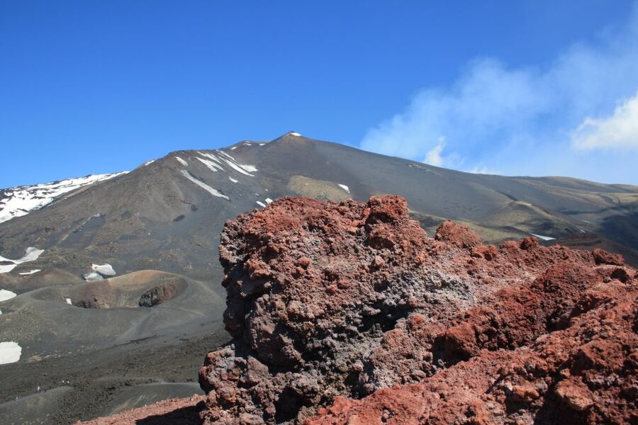 From Catania: Etna tour to the Base of the Summit Craters - Lunch at Etna: baked goods, water, and Etna DOC wine