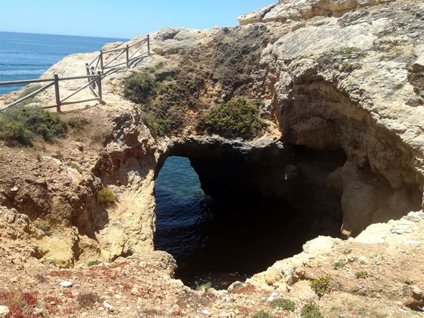 From Faro: 7 Valleys Hiking, Benagil Cave, & Snorkeling Tour - Praia da Marinha Cliffs: The Heart-Shaped Arch Moment