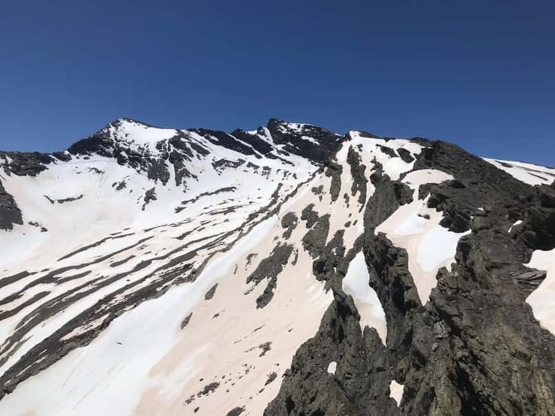 From Granada: High Sierra Nevada hiking experience - Wildlife, waterfalls, and the Africa–Euroasia geology story