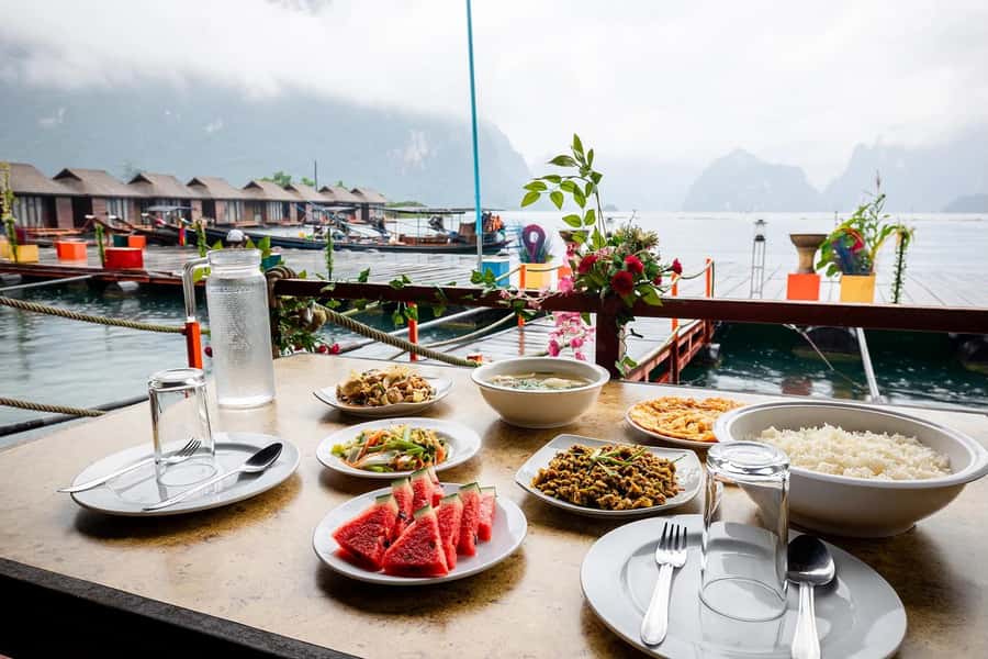 From Krabi: Cheow Lan Lake Cruise and Khao Sok Jungle Hike - Praiwan raft-house lunch and the lake break you’ll want