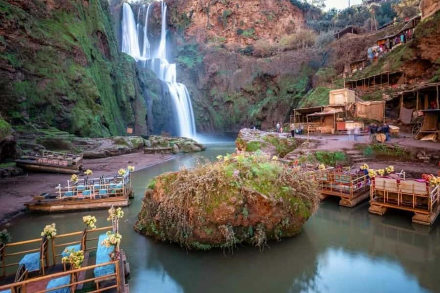 From Marrakech: Ouzoud Waterfalls Guided Hike and Boat Tour - First Look at Ouzoud: Red Cliffs, Olive Groves, and Three Waterfalls