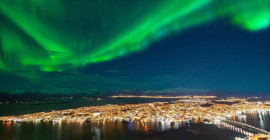 From Tromsø: Evening Fjellheisen Snowshoe Hike and Cable Car - Mountain café break: hot drink, pastry, and a calmer body