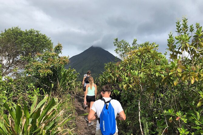 Full Day Tour with Safari Float, Waterfall and Volcano Hike - Arenal Volcano Hike on Old Lava Trails: Slow Pace, Big Views When Weather Cooperates