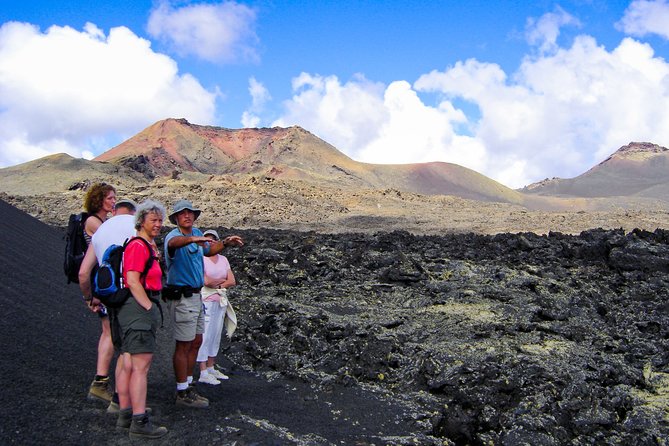 Guided hiking in the Natural Park of Los Volcanes. - Stop at the Timanfaya lava fields: walking the 1730–36 eruption scars