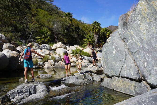 Hidden Waterfalls Hiking Adventure - Sol de Mayo style waterfall time: swim, jump, and explore
