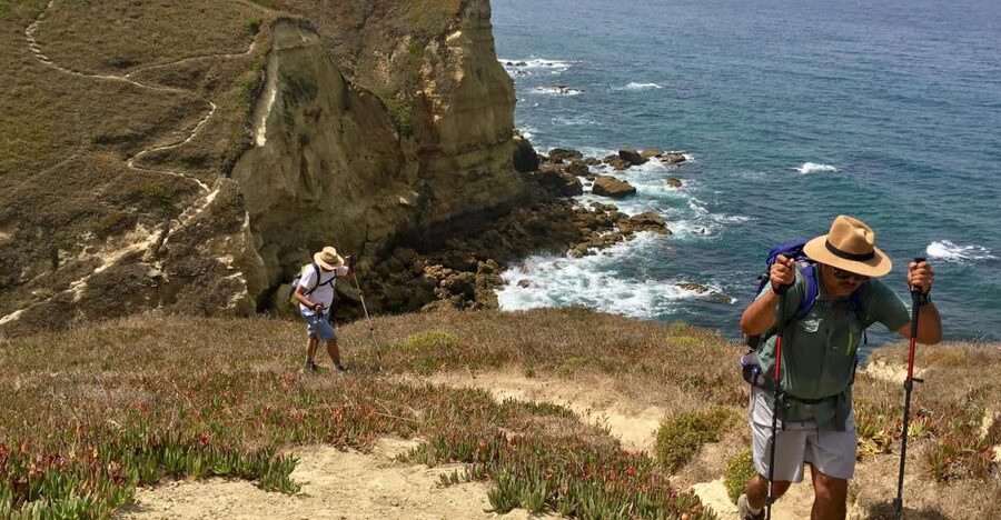 Hiking Tour Along the West Coastline - Praia das Bicas: surfers, sea air, and your first guided orientation