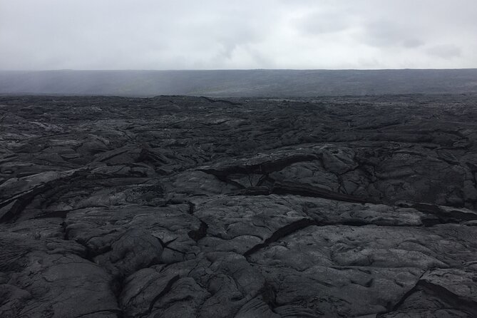 Kilauea Summit to Shore from Kona: Small Group - The Puna Coast on the Red Road: black cliffs, surf, and Kalapana’s story