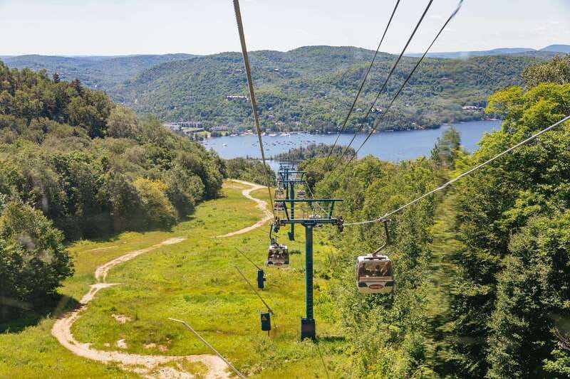 Mont Tremblant: Summit Zip-Lining Tour with 5 Zip Lines - Gondola ride to the summit: 10 minutes of big views before the harness