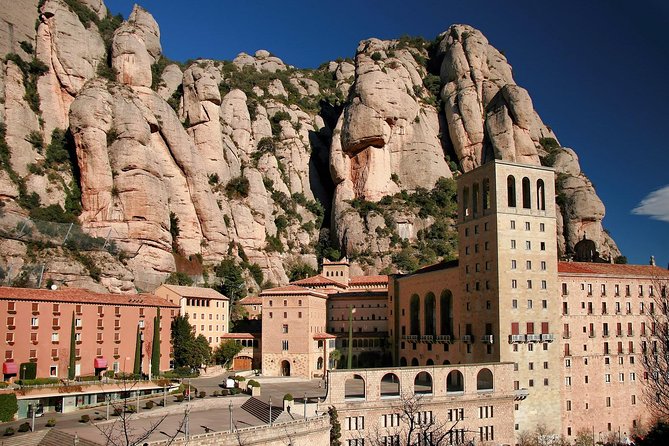 Montserrat Half Day with Cable Car and Easy Hike from Barcelona - Inside Abadia de Montserrat: Basilica, Atrium, and Chapels That Feel Timeless