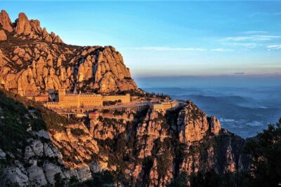 Montserrat Monastery with Easy Hike & Sitges Tour from Barcelona - Entering Abadia de Montserrat: basilica, atrium, and the wow factor