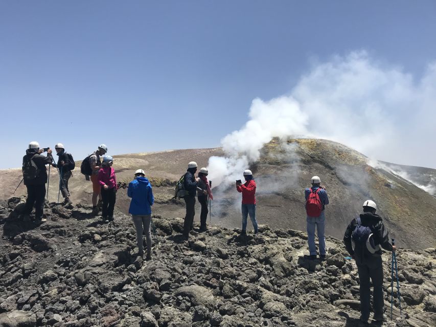 Mount Etna: Summit Crater Trek with Cable Car - The crater circuit: passing 2002 eruption areas and moving through volcanic sand