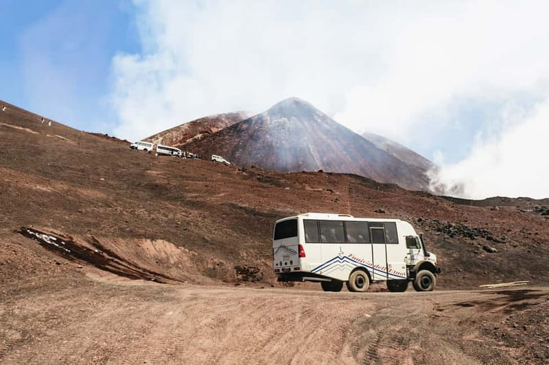 Mount Etna: Summit Trek with Cable Car and snack included - Descent through recent eruption craters and the ride back down