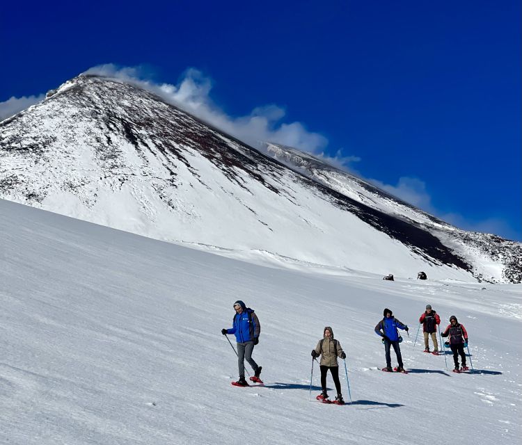 Mount Etna: Volcano Craters Hiking Tour - Valle del Bove return and the descent: knees, snow, and a calmer finish