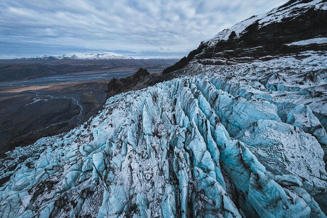Private South Coast with Glacier Hike in Iceland - Reynisfjara black sand beach: awe, wind, and careful footing