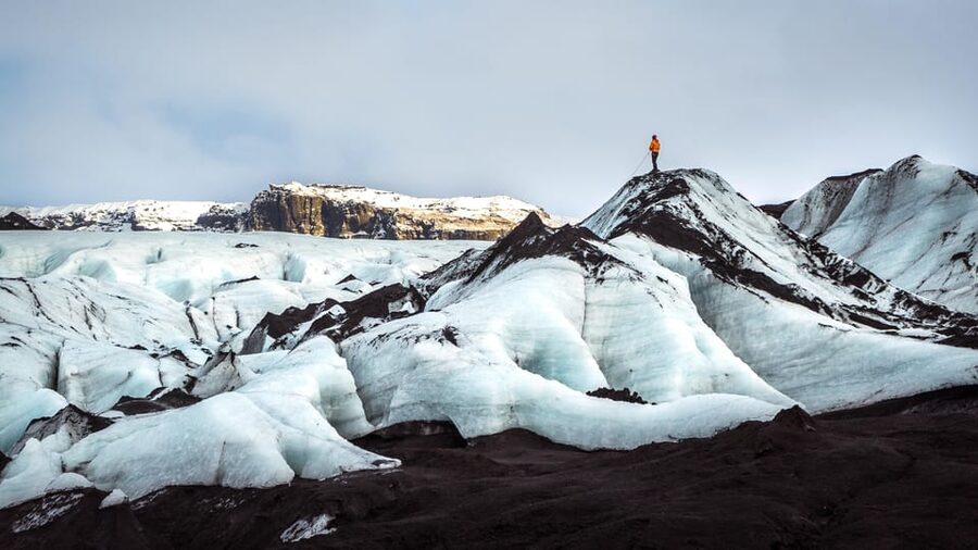 Reykjavik: Glacier Hike & South Coast Day Tour - Reynisfjara black sand beach: basalt columns, sea stacks, and surf that means business