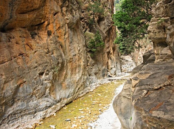 Samaria Gorge Hiking from Chania with Professional Hiking Guide - Agia Roumeli finish: clear water, hot sand, and waiting for the ferry