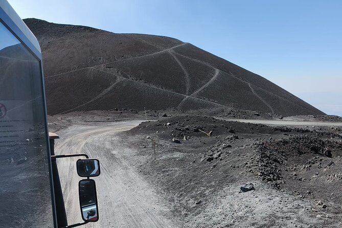 Tour to the Summit Craters of Etna 2920 meters with cable car and Jeep - Inside the lava cave: helmet, torch, and a gentler route than you’d expect