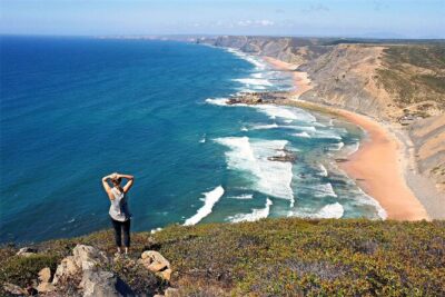 Wild West Coast Hiking Adventure with Sunset Picnic Dinner & Wine - Trail Reality Check: Rocky Ground, Loose Steps, and Cliff-Edge Focus